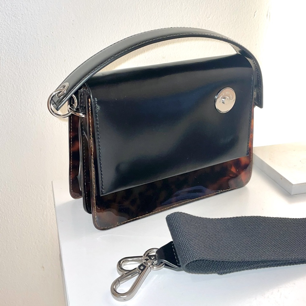 Kara Pinch Tortoise Shoulder Bag with crossbody strap